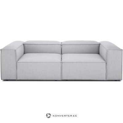 Light gray modular sofa (in flight).