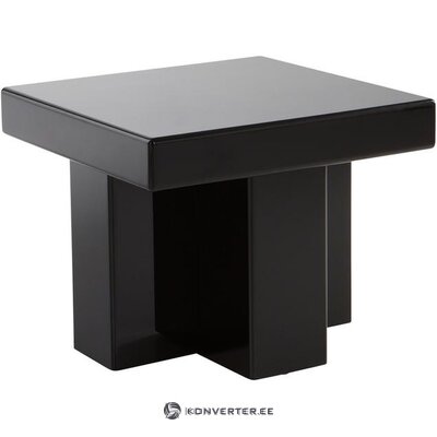 Melns dizaina kafijas galdiņš crozz (jotex) ar skaistuma trūkumiem.