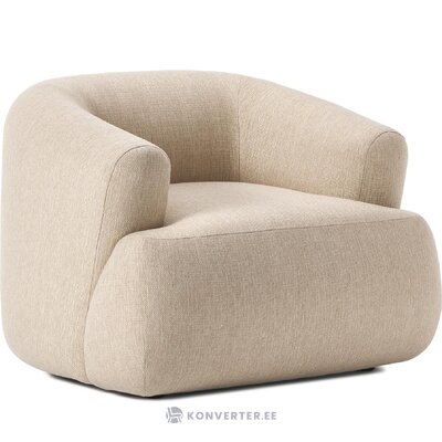 Beige nojatuoli (sofia), jossa kosmeettinen vika