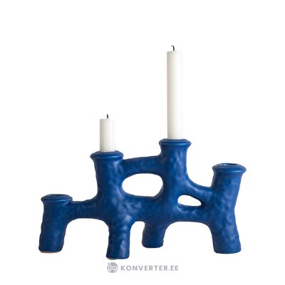Sininen design-kynttilänjalka luca (teksti), jossa kauneusvirheitä.
