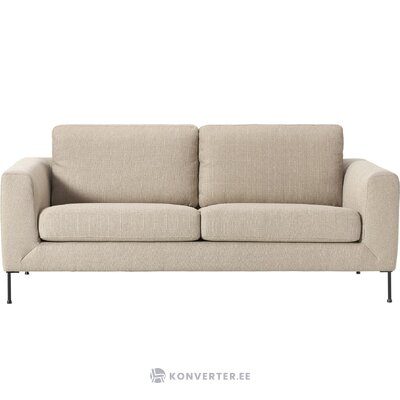 Beige sohva (cucita), jossa kauneusvirheitä.