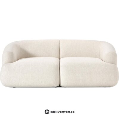 Krēmkrāsas dīvāns (sofa) 190cm ar kosmētisku defektu