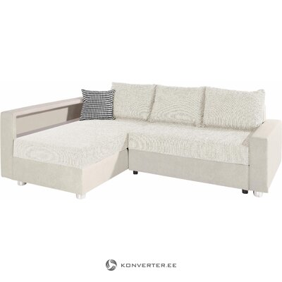 Balta kampinė sofa-lova atsipalaiduoja nepažeista