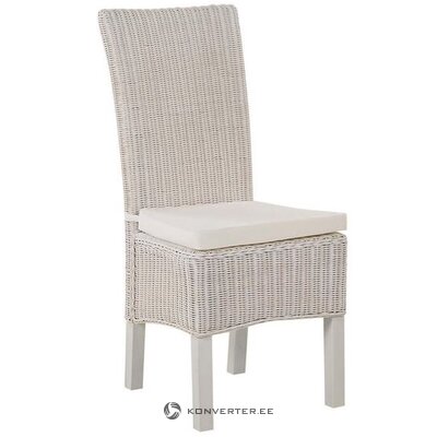 White rattan dining chair giving a whole