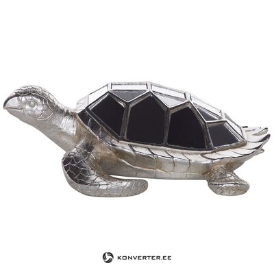 Silver decorative figure with tortoise beauty flaws