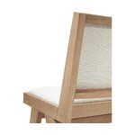 Light brown solid wood design chair (sister) with cosmetic flaws.