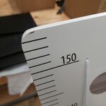 Измерение сантиметровой лентой пространства (блумингвиль) с косметическим дефектом