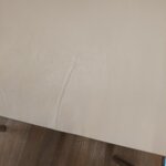 Beige leather design chair (haku) with a cosmetic flaw
