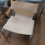 Beige leather design chair (haku) with a cosmetic flaw