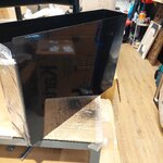 Black metal kitchen shelf tower (yamazaki) with a cosmetic flaw