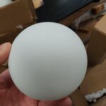 Light beige design wall lamp (nebo) with cosmetic flaws.