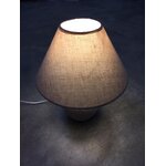 Bēša galda lampa ar ramzi (lucide) skaistuma trūkumiem