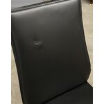 Juodos dizaino odinė valgomojo kėdė calligaris aida sveika