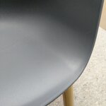 Dark gray chair mork (tomasucci) intact, hall sample, with cosmetic defects.