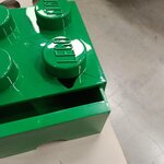 Žalia žaislų dėžutės kaladėlė (Lego)