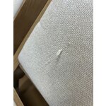Light brown solid wood design chair (sister) with cosmetic flaws.