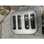 Silver toaster 50&#39;s style (Smeg) with cosmetic flaws.