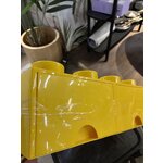 Geltona žaislų dėžutės kaladėlė (Lego)