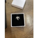 Saturna gredzens (lavani dārgakmeņi)