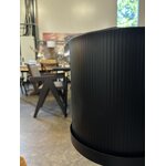 Black design flower pot until purchase (urban nature) with a beauty flaw