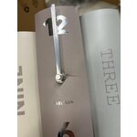 Desk clock (book basics) with beauty flaws.
