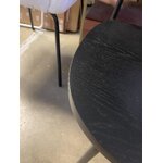 A black chair (nadja) with a beauty flaw