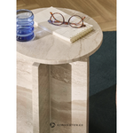 Bright small round coffee table (Marisa) with a cosmetic flaw