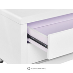 Valkoinen TV-taso (pemborke), jossa kosmeettisia vikoja.